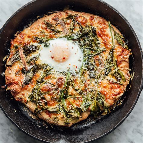 white-skillet-pizza-with-spring-greens-and-an-egg image