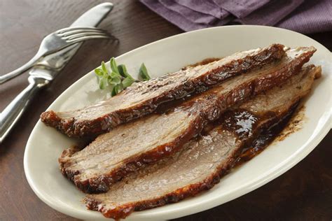 sweet-and-savory-coca-cola-brisket-recipe-the-spruce image