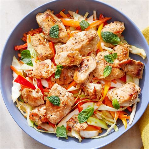 spicy-sesame-chicken-salad-with-cabbage-peppers image