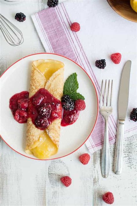 french-crpes-with-lemon-curd-fresh-berries image
