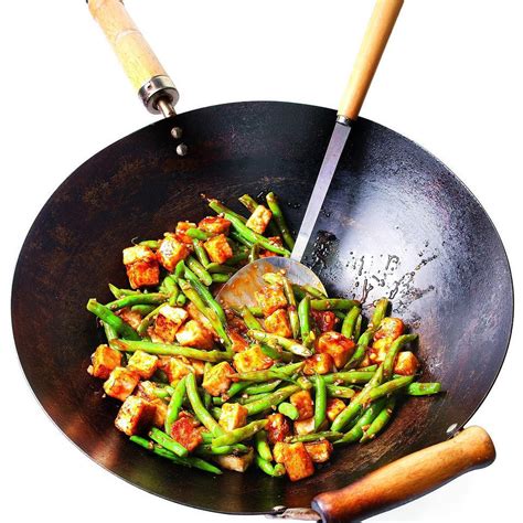 szechuan-tofu-green-bean-stir-fry-eatingwell image