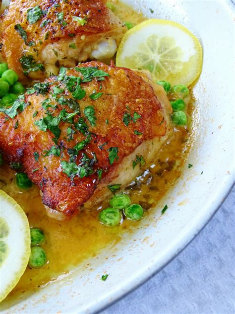 creamy-lemon-chicken-thighs-with-peas-proud image