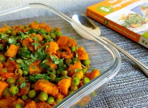 curried-sweet-potatoes-with-green-peas-simple image
