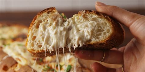 best-chicken-alfredo-bread-boat-recipe-delish image