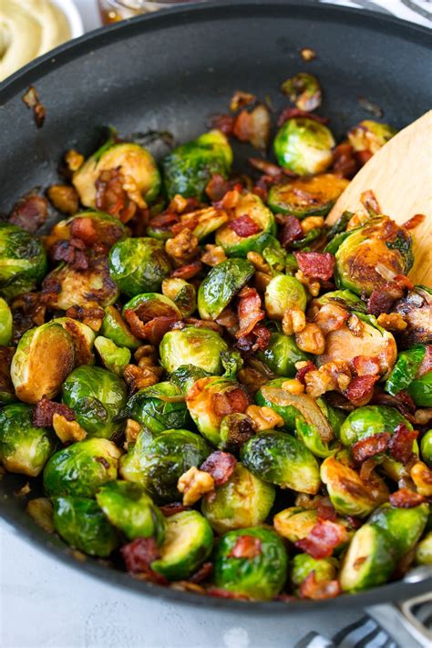 sauteed-brussels-sprouts-with-bacon-onions-and-walnuts image