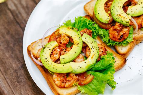shrimp-sandwiches-with-chili-mayonnaise-the-daily-meal image