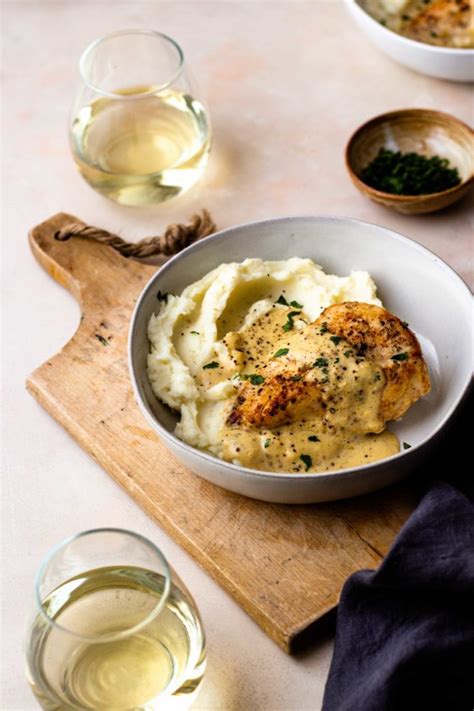 chicken-with-creamy-dijon-sauce-and-mashed-potatoes image