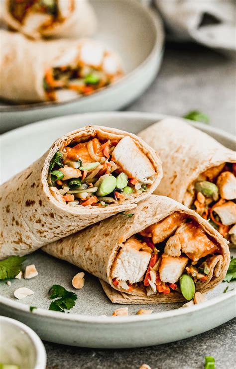asian-chicken-wraps-with-thai-peanut-sauce image