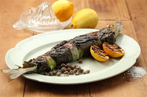 fish-wrapped-in-vine-leaves-recipe-maggie-beer image