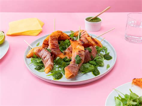 grilled-prosciutto-wrapped-cantaloupe-with-chimichurri image