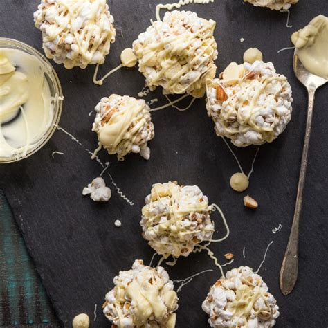 an-easy-recipe-for-white-chocolate-popcorn-balls image