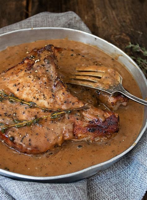 pork-chops-with-peppercorn-sauce-seasons-and-suppers image