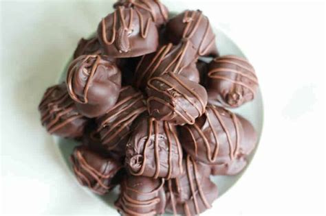 chocolate-covered-pecan-butter-truffles-half-baked image