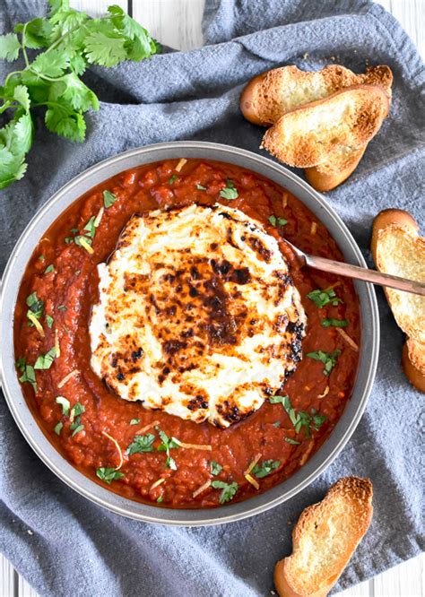 baked-goat-cheese-in-tomato-sauce image