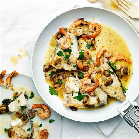 braised-halibut-with-mushrooms-and-shrimp-food-wine image