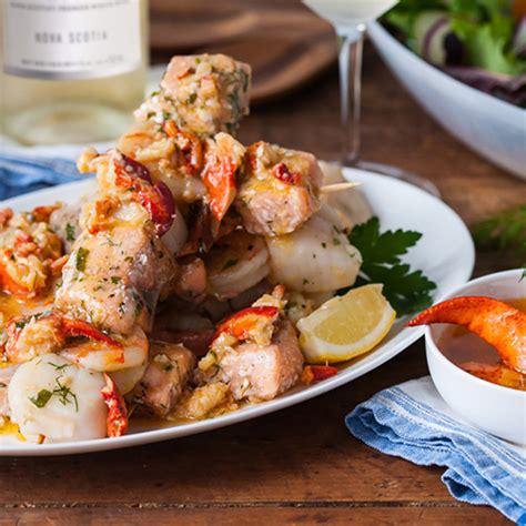 mynslc-seafood-brochettes-with-lemon-lobster-butter image