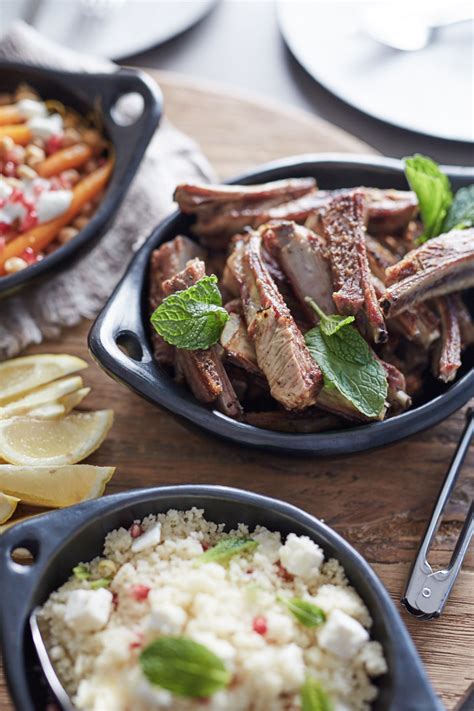 bbq-lamb-riblets-with-sweet-glazed-carrots-couscous image