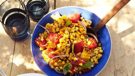 charred-corn-salad-with-basil-and-tomatoes-bon-appetit image