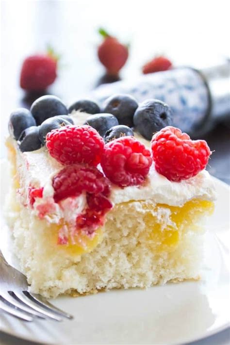 lemon-poke-cake-with-berries-dash-of-sanity image