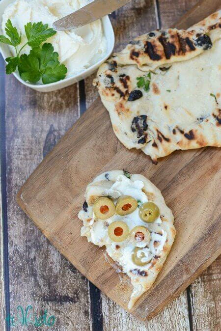 grilled-olive-herb-flatbread-and-whipped-feta-spread image