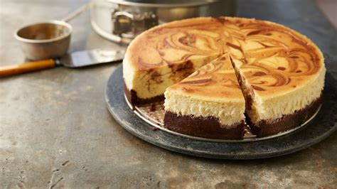 caramel-hot-fudge-swirled-cheesecake image