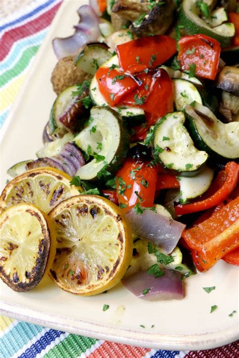 oven-roasted-vegetables-with-garlic-lemon-sauce image