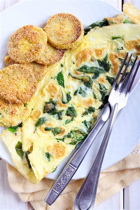 easy-omelet-with-feta-spinach-and-tomato-31-daily image