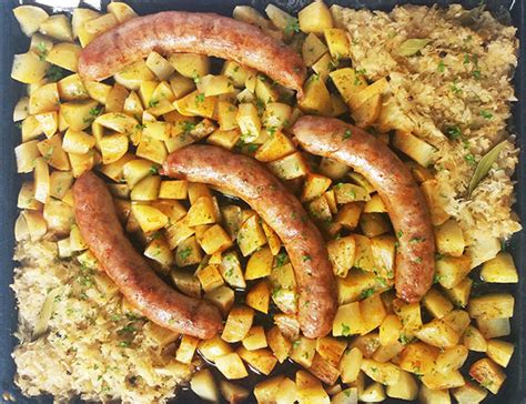 sheet-pan-roasted-potatoes-sausage-and-sauerkraut image
