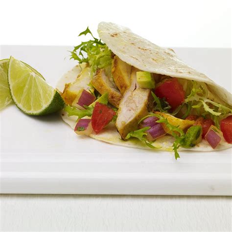 turmeric-chicken-tacos-with-tomato-avocado-salsa image