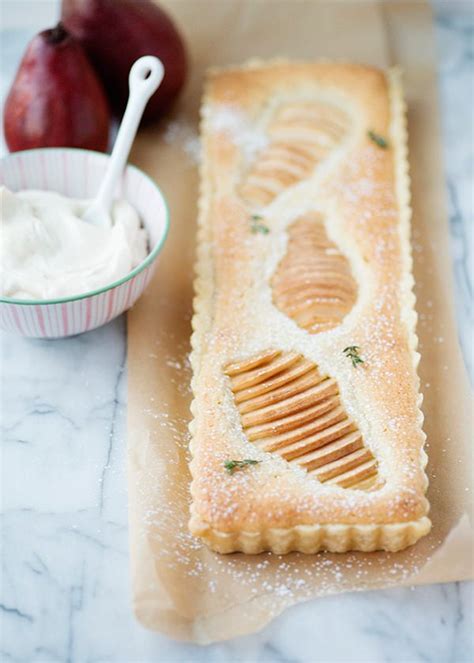 pear-almond-tart-with-amaretto-cream-baked-bree image