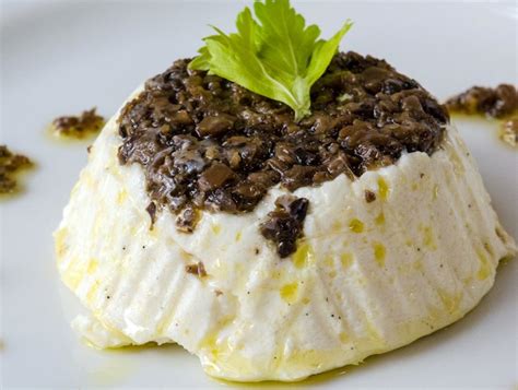 sformatino-di-ricotta-with-black-truffle-sauce-honest image