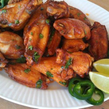 sriracha-lime-chicken-wings-white-lights-on image