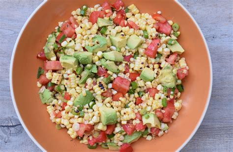 charred-corn-salad-with-tomatoes-and-avocados image