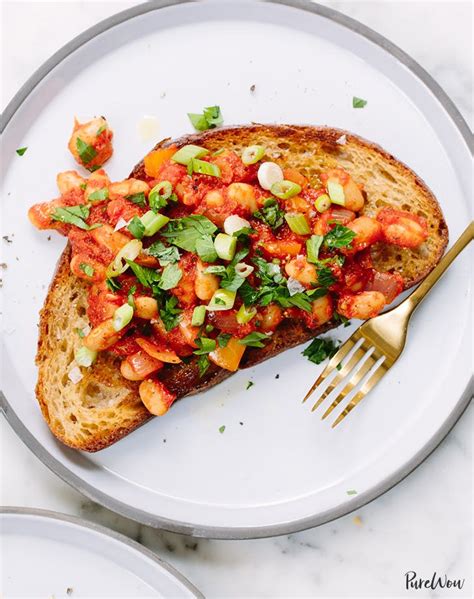 tomato-and-white-bean-stew-on-toast-purewow image