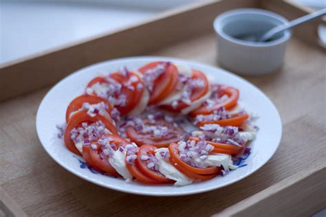 tomato-salad-with-mozzarella-and-red-onions image