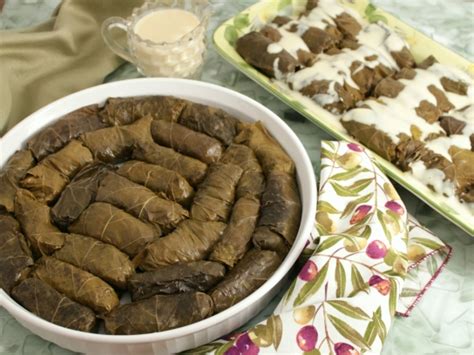 dolmades-greek-stuffed-grape-leaves-with-tomato image