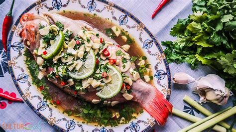 thai-steamed-fish-recipe-with-lime-and-garlic-sauce image