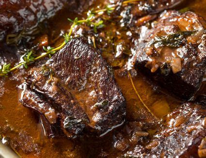 beef-short-ribs-recipe-with-onion-gravy-the-spruce image