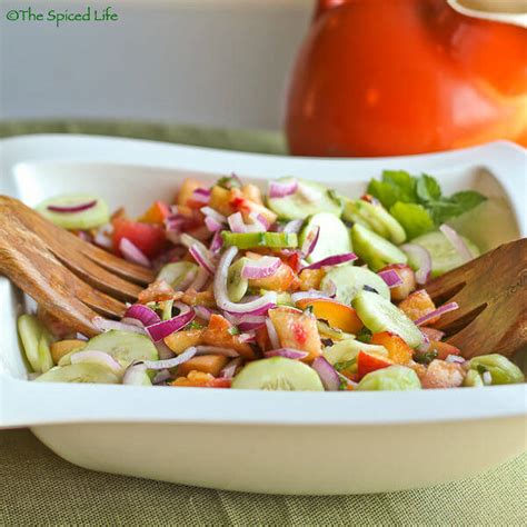 cucumber-and-peach-salad-with-mint-basil-vinaigrette image
