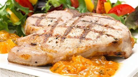 grilled-pork-chops-with-chili-spiked-fresh-apricot-sauce image
