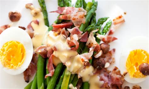 warm-asparagus-salad-with-bacon-egg-and-hazelnuts image