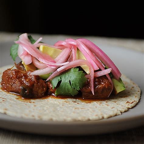 slow-cooked-pork-stew-meat-tacos-food52 image