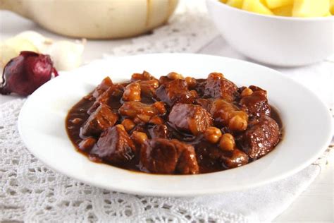 spanish-pork-stew-with-chickpeas-and-onions-where image