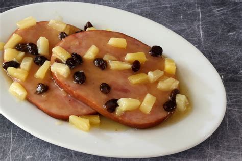 baked-ham-slices-with-pineapple-sauce image