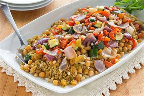 moroccan-spiced-couscous-with-chickpeas-and-roasted-vegetables image