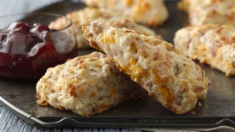 ham-and-cheddar-scones-with-rosemary-cherry-sauce image