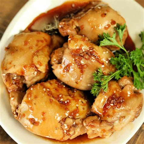 crock-pot-honey-garlic-chicken-thighs-eating-on-a image