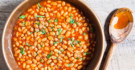 slow-cooker-baked-beans-recipe-purewow image