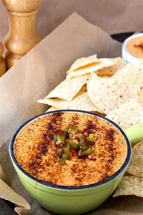 easy-spicy-queso-dip-never-by-nacho-cheese-sauce image