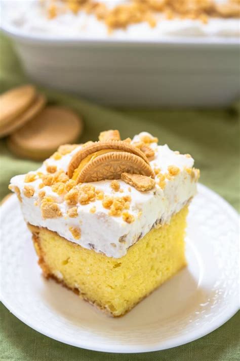 lemon-pudding-poke-cake-a-burst-of-sunshine-hostess image